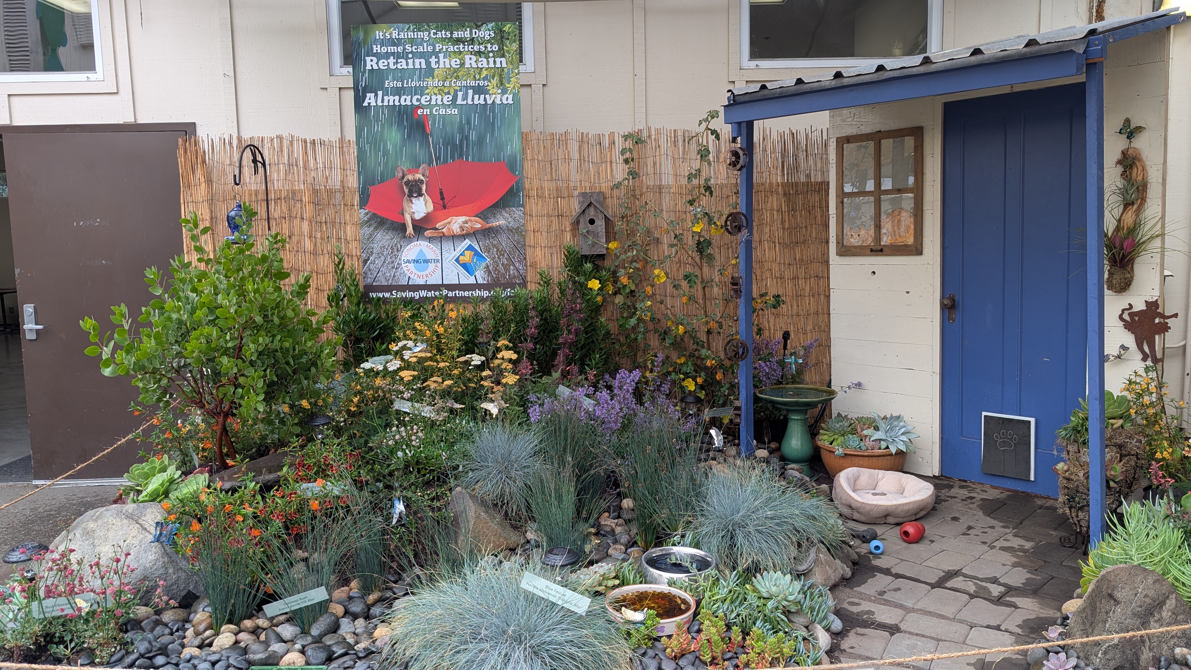 Demonstration garden exhibit featuring a rain garden, low water use plants, and pollinator habitat.